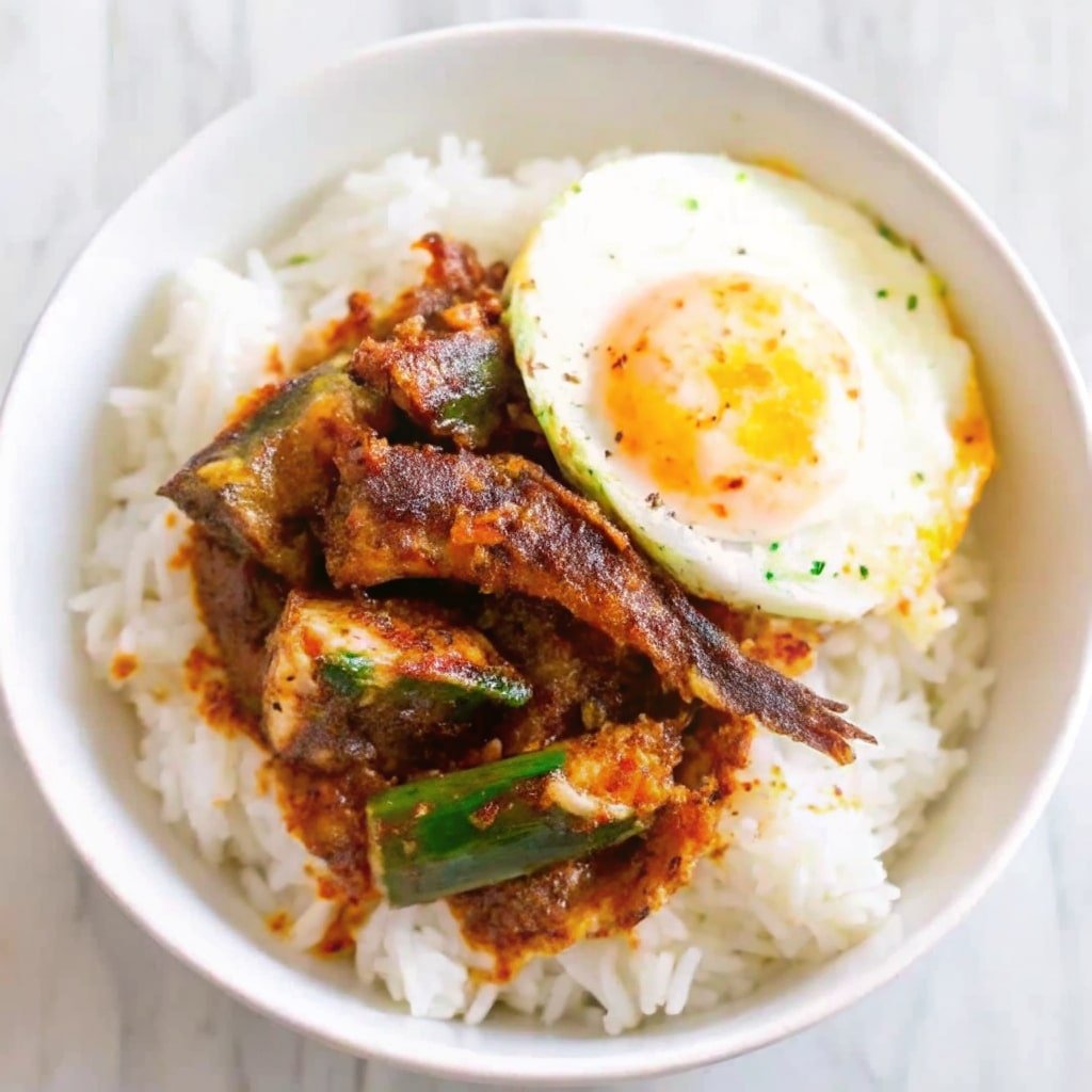 Sardines in Tomato Sauce: The Best Way to Build a Tasty Sardine Rice Bowl 1 erved sardine rice bowl with toppings